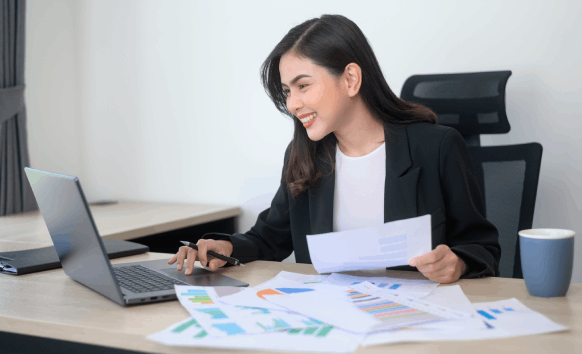 A translator checks a legal contract for Translation Services in Brooklyn, delivering accurate document solutions quickly.