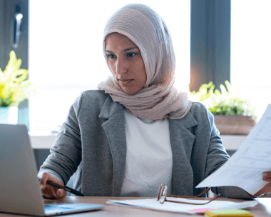 A client uploads a passport scan for a USCIS case as Arabic Translation Services in New York prepare a certified file.