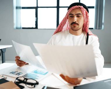 A paralegal reviews an official Arabic court exhibit, relying on Arabic Translation Services in New York for accurate.