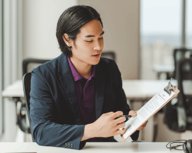 A translator assembles an I-130 packet, using Chinese Translation Services in New York for USCIS immigration docs.