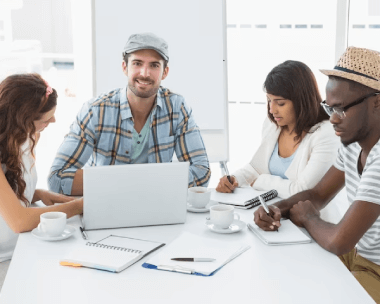 A diverse team of translators in New York working on a project with industry-specific terminology.