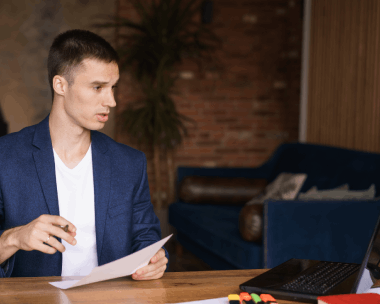 A translator formats a government form with legal approval, using Russian Translation Services in New York today.
