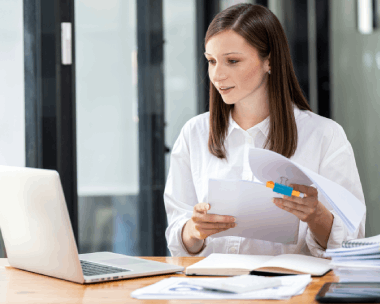 A specialist edits a localized equipment manual with Translation Services in Manhattan for technical industries and ISO.