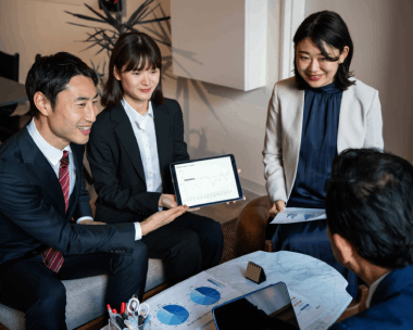 A brand team reviews a tagline adaptation with Chinese Translation Services in New York to keep cultural authenticity intact.