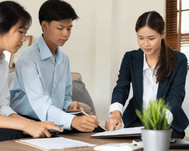 An insurance adjuster checks a bilingual claims form as Chinese Translation Services in New York prepares filings.