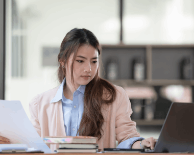 A certified translator finalizing a Marriage Certificate translation in New York, ensuring it meets official standards.