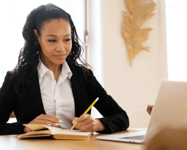 A translator formats an official-use packet for Haitian Creole Translation Services in New York with seals and page numbers.