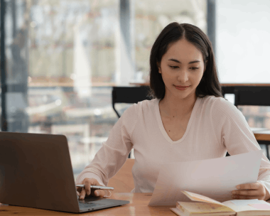 A client reviews an official ID translation, using Spanish Translation Services in New York for accurate records.