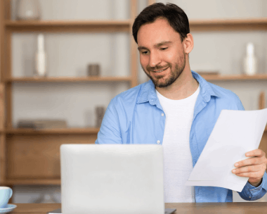 A client reviews a USCIS packet with certified pages, using Translation Services in Brooklyn for official filing.