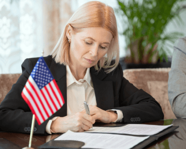A translator checks a birth certificate, showing Translation Services in Queens for accurate official documents submissions.