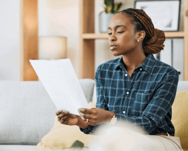 A property manager updates an online listing after Haitian Creole Translation Services in New York for real estate marketing.