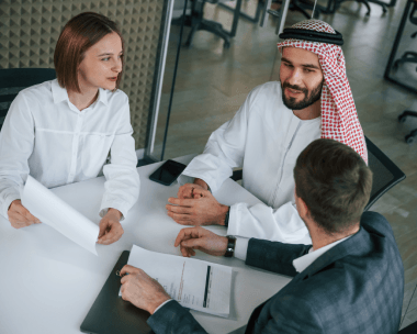 A translator checks a property deed using Arabic Translation Services in New York City for real estate names and parcel data.