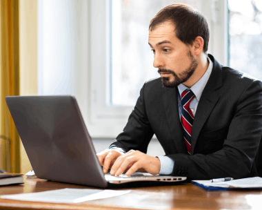 A translator works on a Russian lease packet using Russian Translation Services in New York for Manhattan real estate.