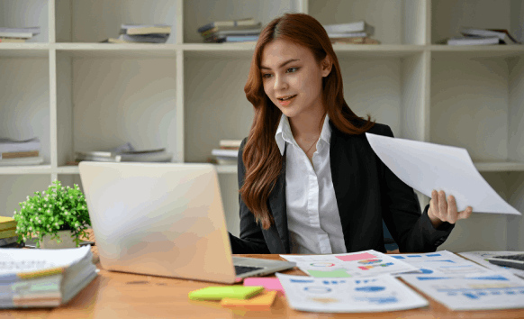 A translator prepares certified business and personal documents for Spanish Translation Services in New York on a desk.