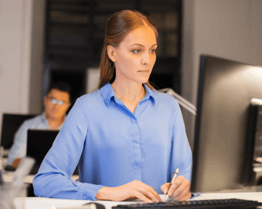 A translator edits a machinery manual using Russian Translation Services in New York for technical content and corporate.