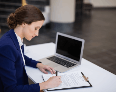 A QA reviewer signs a certified technical document after Translation Services in Bronx verifies terminology and layout.