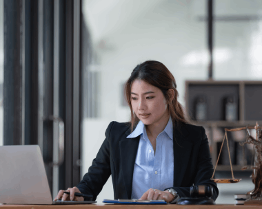 Lawyer reviews a translated contract at a desk, using Translation Services in Manhattan for legal filings.